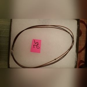 Leather & Sterling Silver necklace.